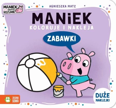 Maniek koloruje i nakleja. Zabawki